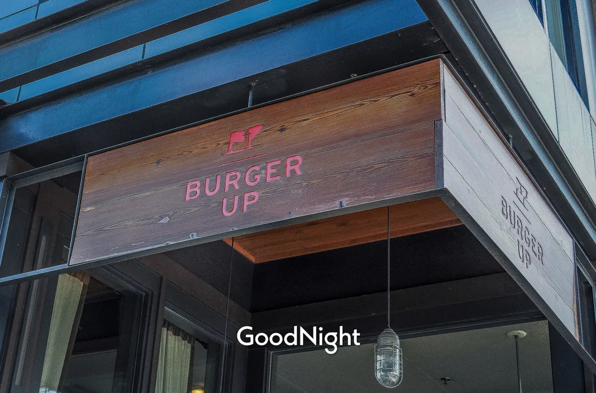 An inviting restaurant entrance with clear signage, welcoming guests for casual dining. The exterior suggests a laid-back, social setting ideal for family meals or casual outings.